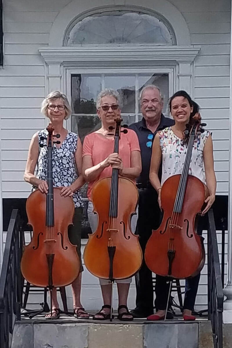 Keys and Strings pose for a photo with three chelos in front of them