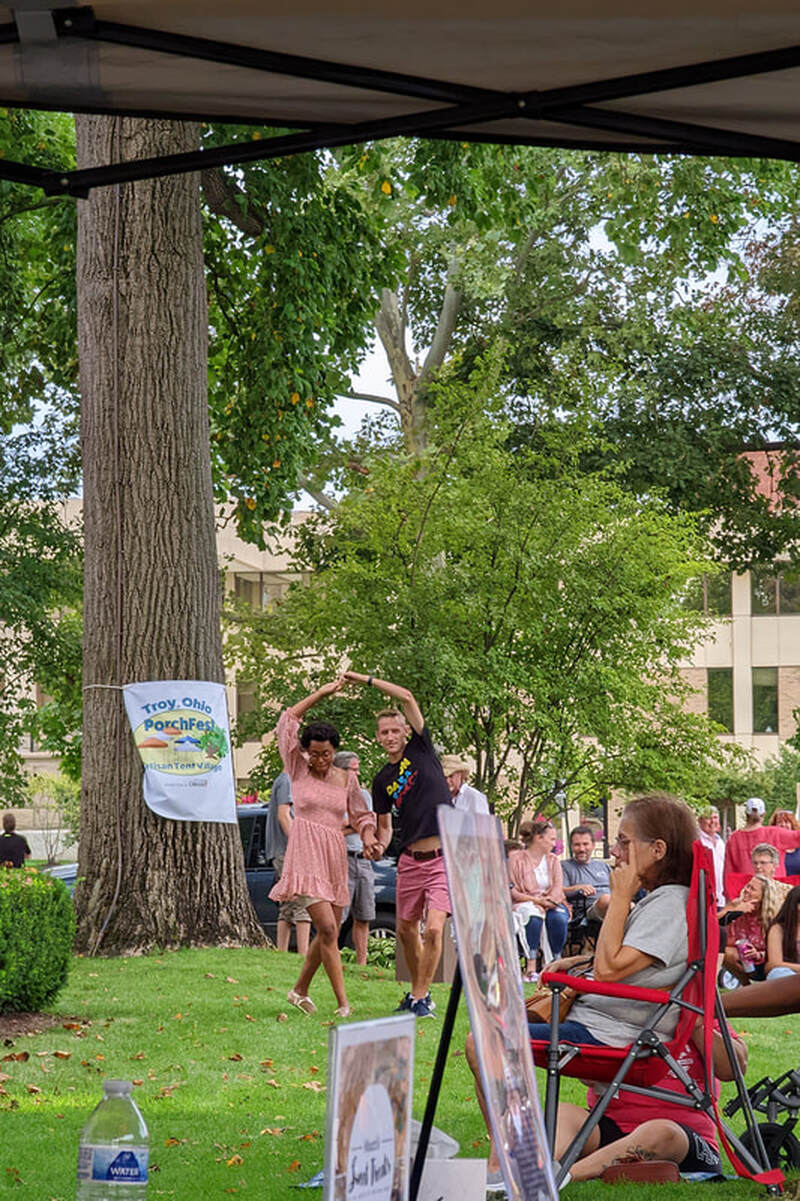 Crowd members dancing at Troy Porch Fest
